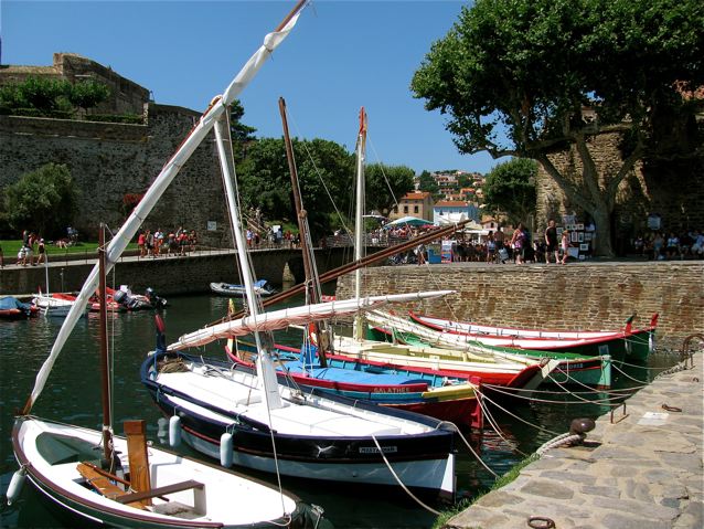Family travel in picturesque Collioure, France in southern France, sailboats Family travel in picturesque Collioure, France in southern France, sailboats