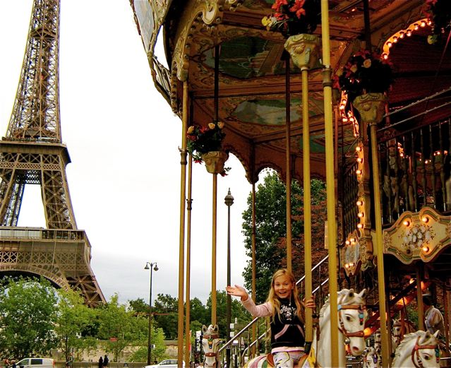 family travel paris eiffel tower merry go round family travel paris eiffel tower merry go round