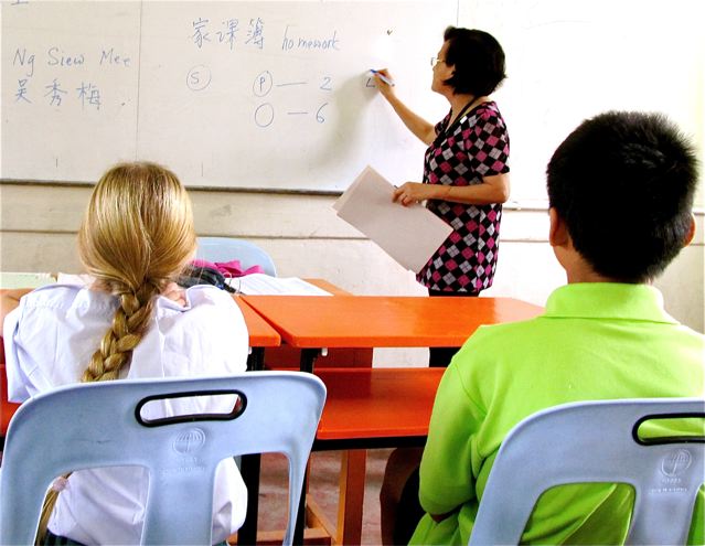 Our daughter in her class room in Chinese school in Malaysia Our daughter in her class room in Chinese school in Malaysia