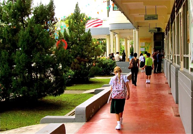 walking the halls of her Chinese high school in Asia on first day walking the halls of her Chinese high school in Asia on first day