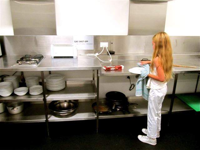 kiddo drying dishes at hostel in sydney kiddo drying dishes at hostel in sydney