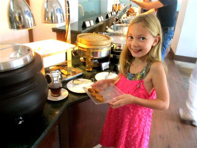 Happy Kid at breakfast buffet at Fairmont Singapore