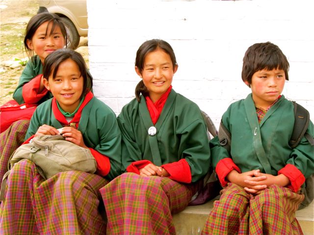 school kids in Bhtuan in traditional school uniforms school kids in Bhtuan in traditional school uniforms