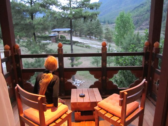 Enjoying our terrace view from the beautiful Zhiwa Ling Hotel near Tiger's Nest in Bhutan Enjoying our terrace view from the beautiful Zhiwa Ling Hotel near Tiger's Nest in Bhutan