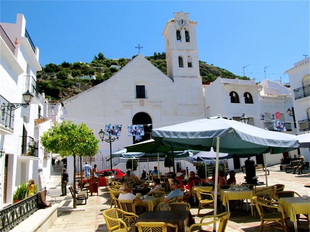 family travel spain white village church square family travel spain white village church square