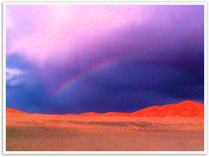 rainbow in the Sahara in Africa