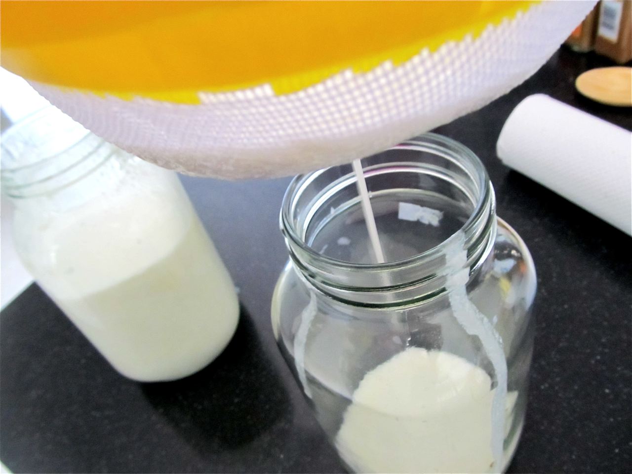 using a strainer to make kefir