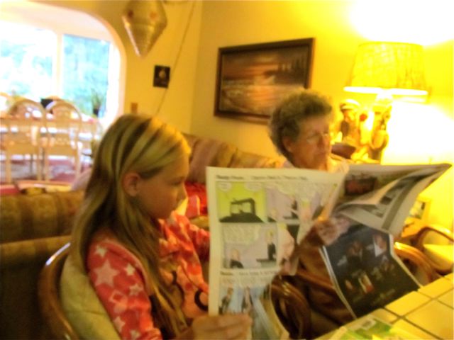 reading the paper with Grandma reading the paper with Grandma