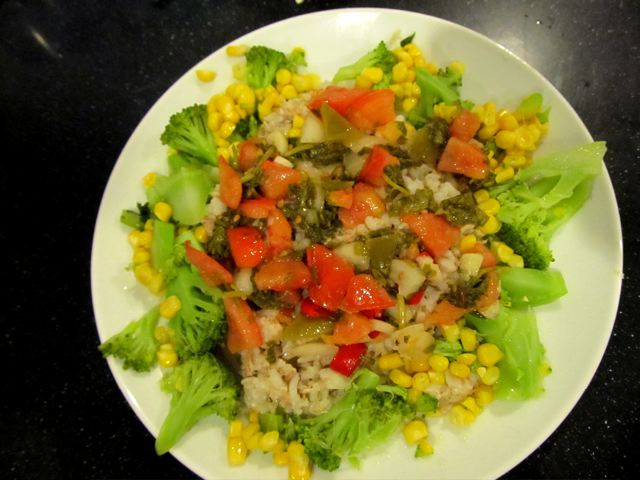 Delicious family supper of organic broccoli, corn, pastured chicken, soaked brown rice and topped with homemade lacto-fermented salsa Delicious family supper of organic broccoli, corn, pastured chicken, soaked brown rice and topped with homemade lacto-fermented salsa