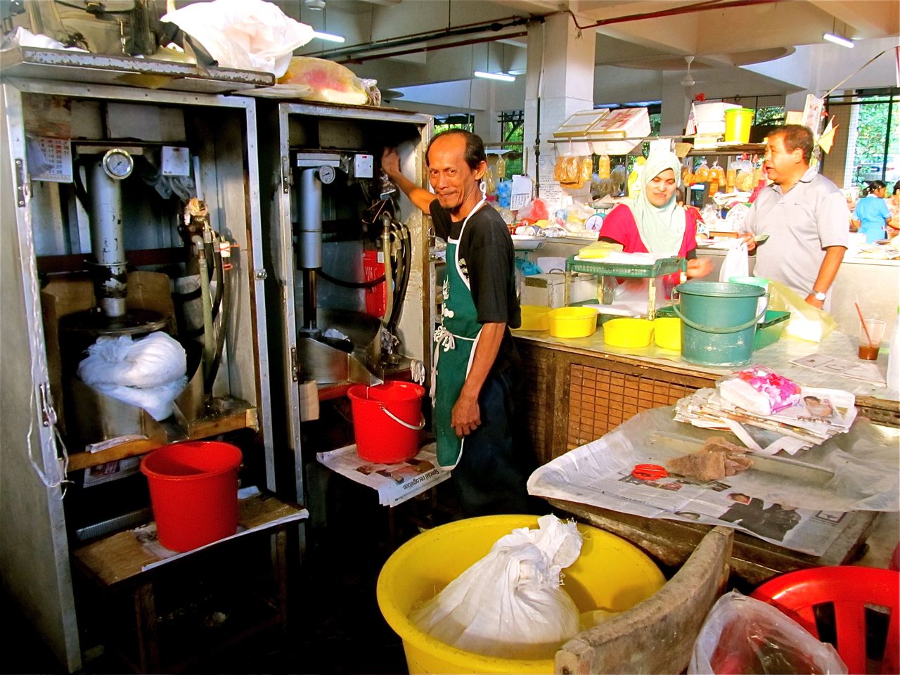 wet market in Penang selling freshly made coconut products wet market in Penang selling freshly made coconut products