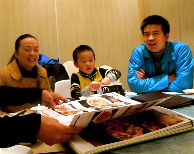 Our Beijing homestay family - at our first dinner together Our Beijing homestay family - at our first dinner together