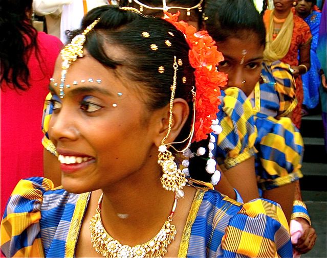 Indian girl face in traditional festival make up and jewels Indian girl face in traditional festival make up and jewels