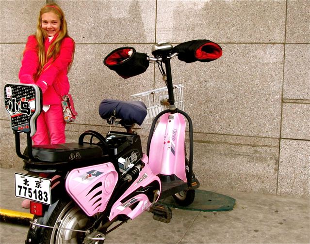 cute electric bike in China with cute kid cute electric bike in China with cute kid