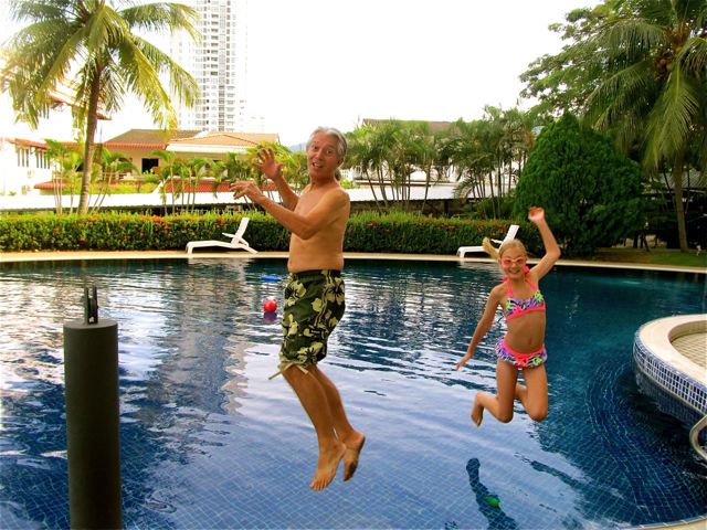 Father -Daughter relationships start by time together like this happy pool jump photo Father -Daughter relationships start by time together like this happy pool jump photo