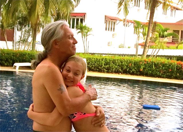 A loving dad and daughter hugging this Father's Day A loving dad and daughter hugging this Father's Day