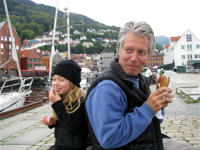 traveling dad and daughter sharing a laugh in Norway traveling dad and daughter sharing a laugh in Norway