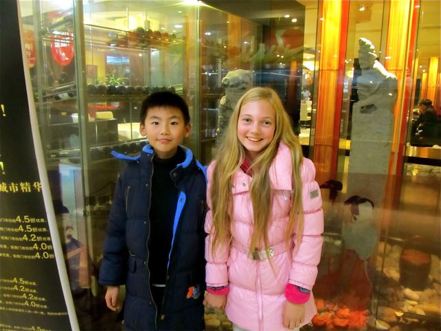 Well traveled Mozart with Chinese friend in Xi'an, China Well traveled Mozart with Chinese friend in Xi'an, China
