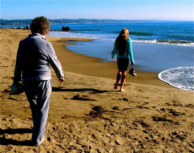 Mozart walking on the beach in California with her 86 year old Grandmother ( who naturally still has dark hair)