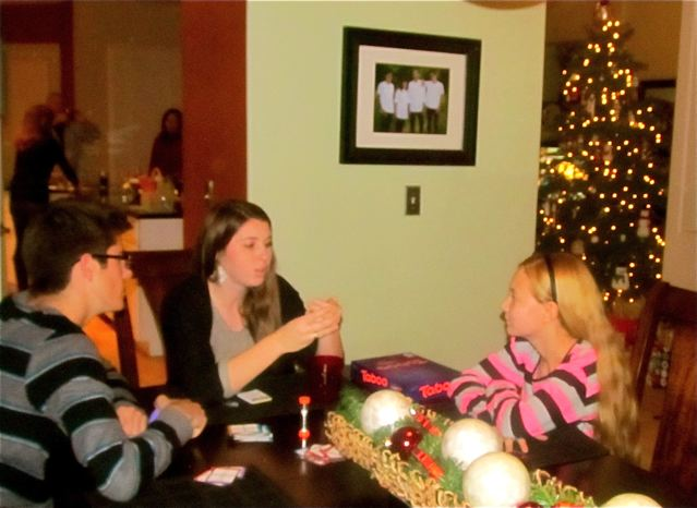 Teens playing games on Christmas Eve