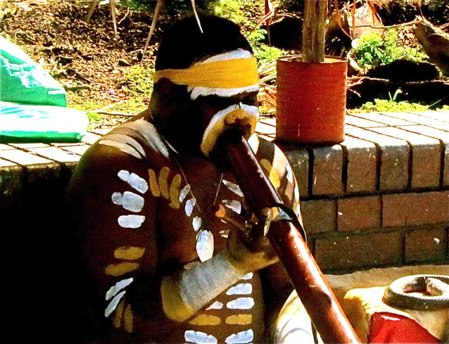 Aboriginal playing didgeridoo Aboriginal playing didgeridoo