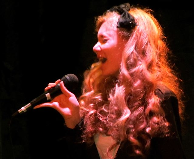 Travel teen Mozart singing and feeling the music Travel teen Mozart singing and feeling the music