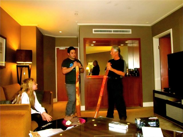 learning didgeridoo at Four Seasons Sydney with Gifts of the Quay store owner and master didge player learning didgeridoo at Four Seasons Sydney with Gifts of the Quay store owner and master didge player