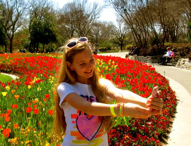 RTW Travel teen Mozart taking a selfie in the Tulips RTW Travel teen Mozart taking a selfie in the Tulips