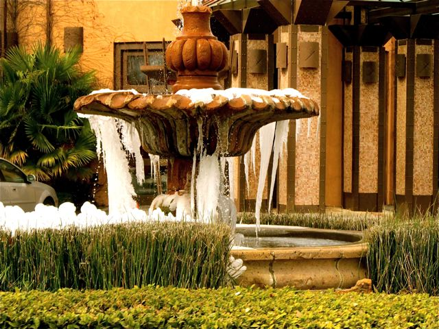 winter melts into spring - beautiful fountain of icicles winter melts into spring - beautiful fountain of icicles