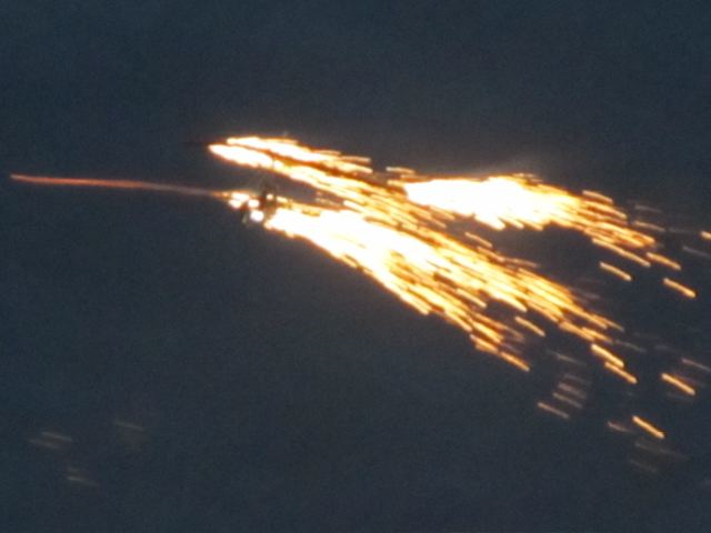 amzing planes on fire amongst fireworks amzing planes on fire amongst fireworks