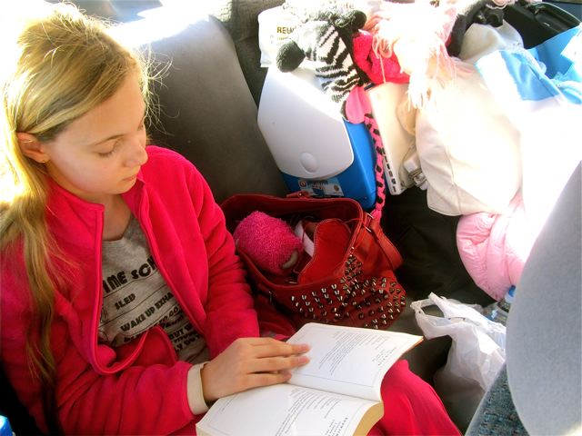 Southwest Road Trip kid with book 