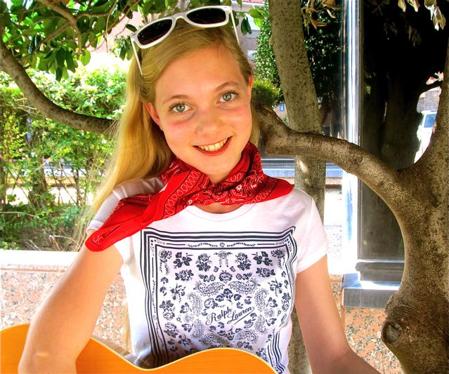 travel teen Mozart singing with guitar travel teen Mozart singing with guitar