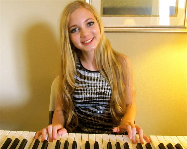 Singer, songwriter, pianist Mozart performing before flying off to New York Fashion Week Singer, songwriter, pianist Mozart performing before flying off to New York Fashion Week
