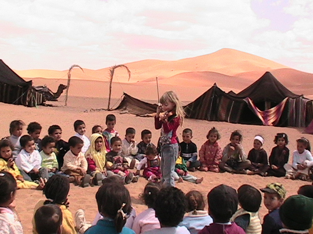 The Top 10 Reasons to Travel with Kids - Mozart giving a concert in the Sahara in Morocco The Top 10 Reasons to Travel with Kids - Mozart giving a concert in the Sahara in Morocco