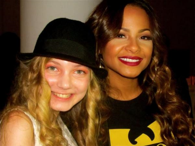 Singers Mozart and Christina Milian at Elle show at New York Fashion Week filmed or E! Network TV show Singers Mozart and Christina Milian at Elle show at New York Fashion Week filmed or E! Network TV show