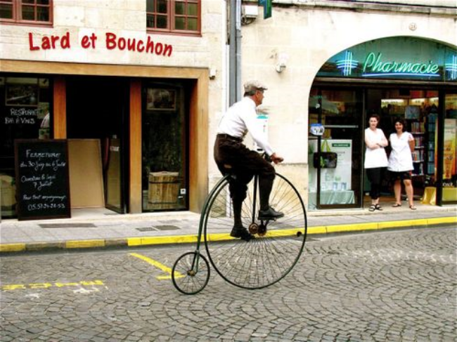 Biking Bordeux France in old fashion bike