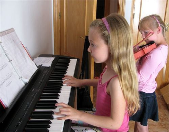 Mozart making music with a friend in Spain Mozart making music with a friend in Spain