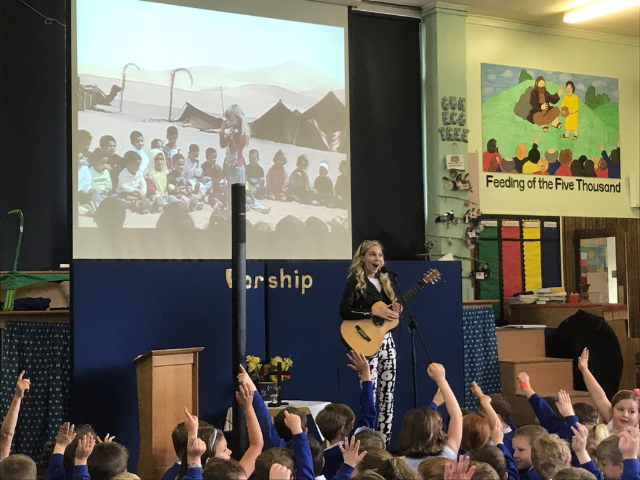 Mozart Dee aka MuzicbyMozart performing in England for students Mozart Dee aka MuzicbyMozart performing in England for students