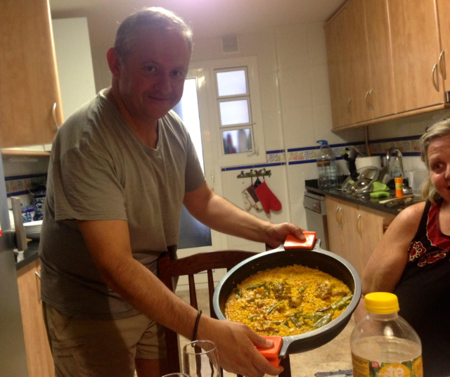 Dinner with friends making paella in Spain Dinner with friends making paella in Spain