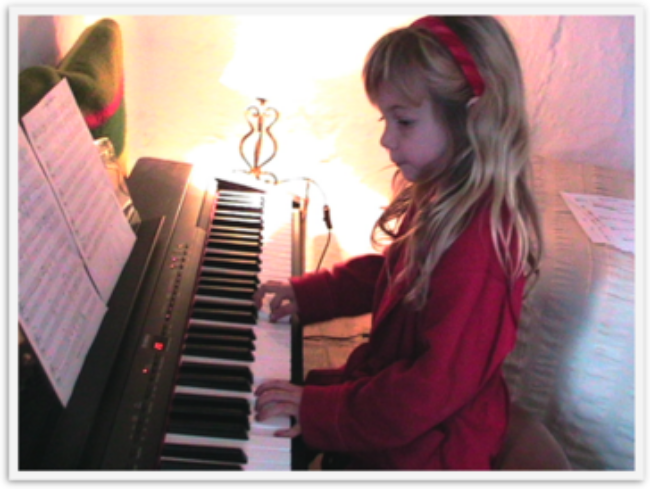 travel kid Mozart playing piano in Spain travel kid Mozart playing piano in Spain