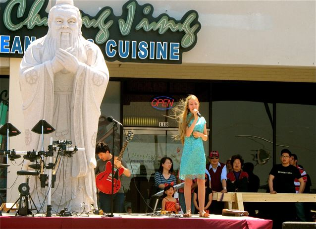 Heavenly Reyna at 13 singing in Mandarin in Dallas China Town Heavenly Reyna at 13 singing in Mandarin in Dallas China Town