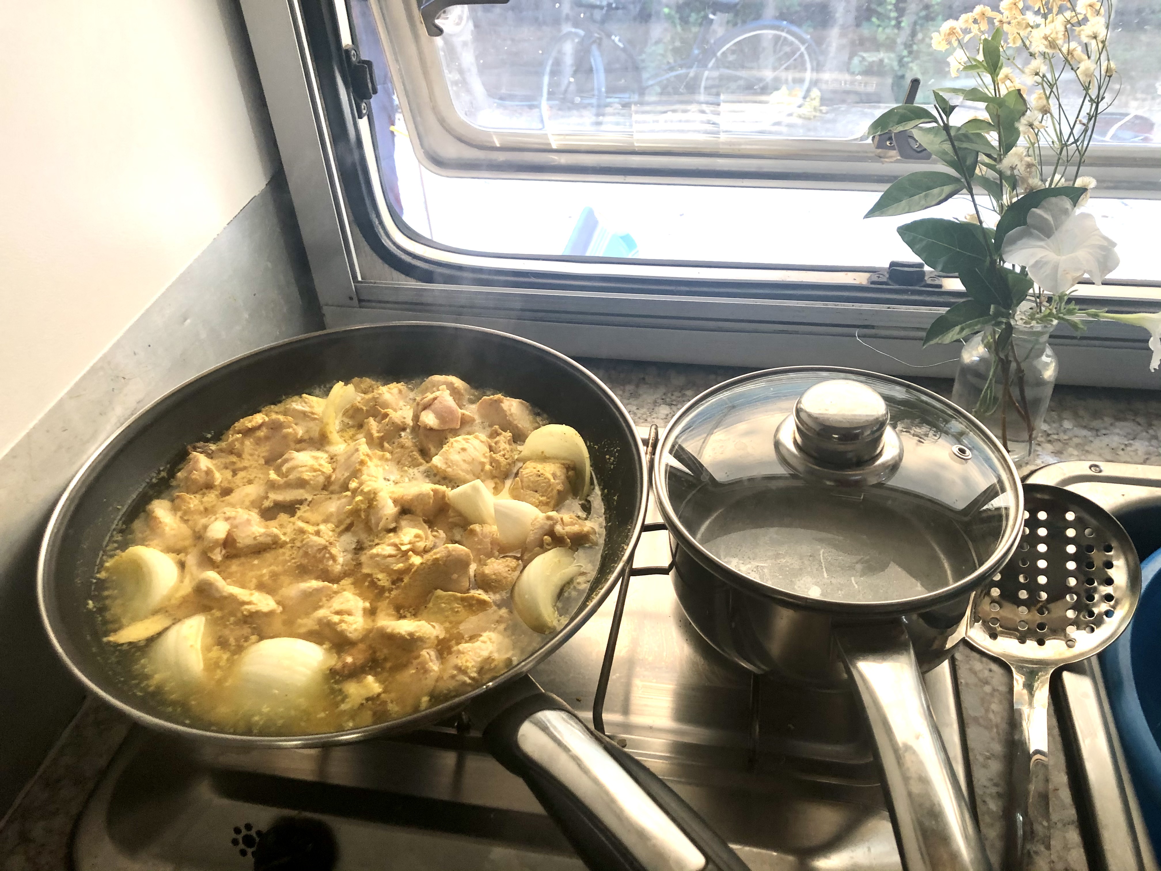 Camping Spain Simple Pleasures cooking inside a camper Camping Spain Simple Pleasures cooking inside a camper