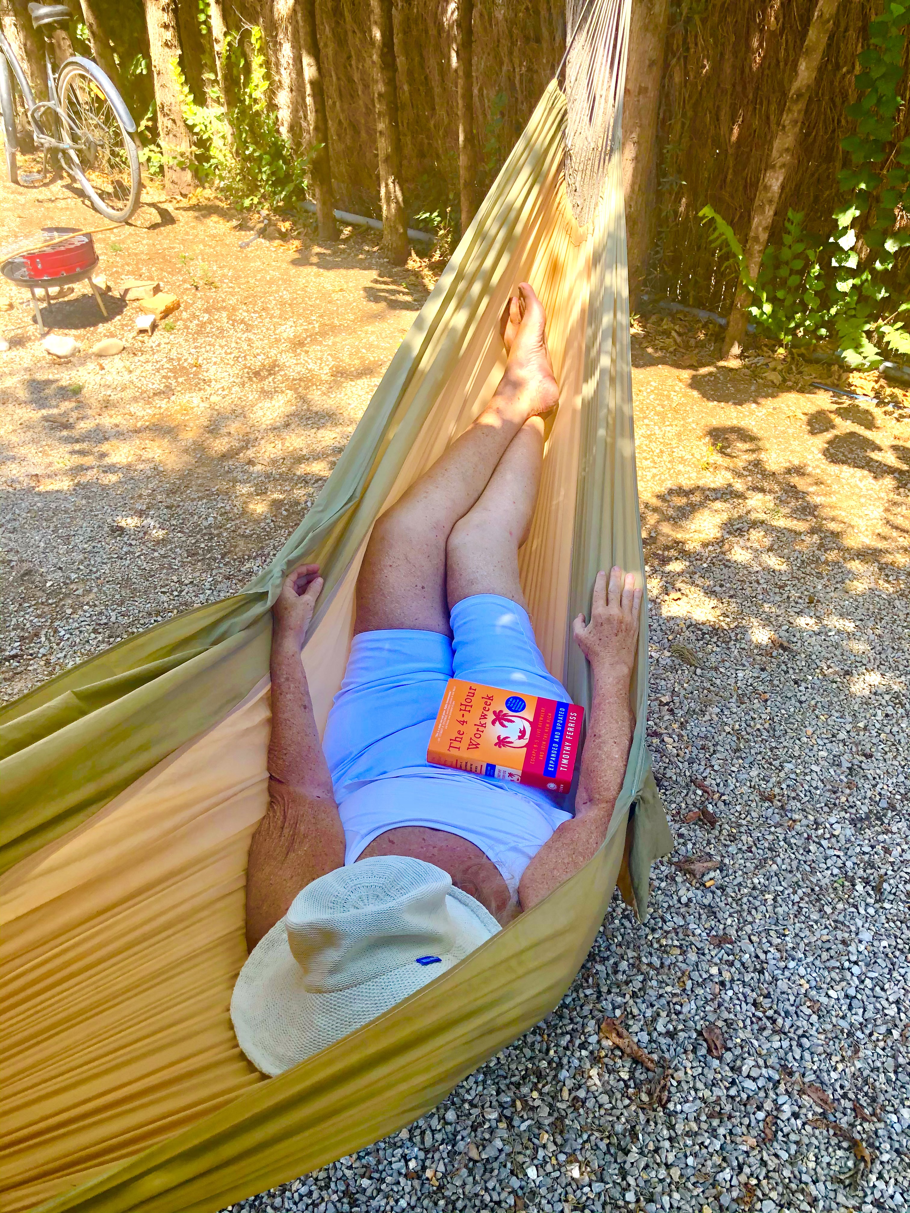 Camping Spain Simple Pleasures reading 4HWW book in hammock campsite Camping Spain Simple Pleasures reading 4HWW book in hammock campsite